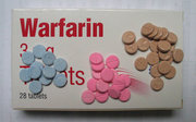 3mg (blue), 5mg (pink) and 1mg (brown) warfarin tablets (UK colours)